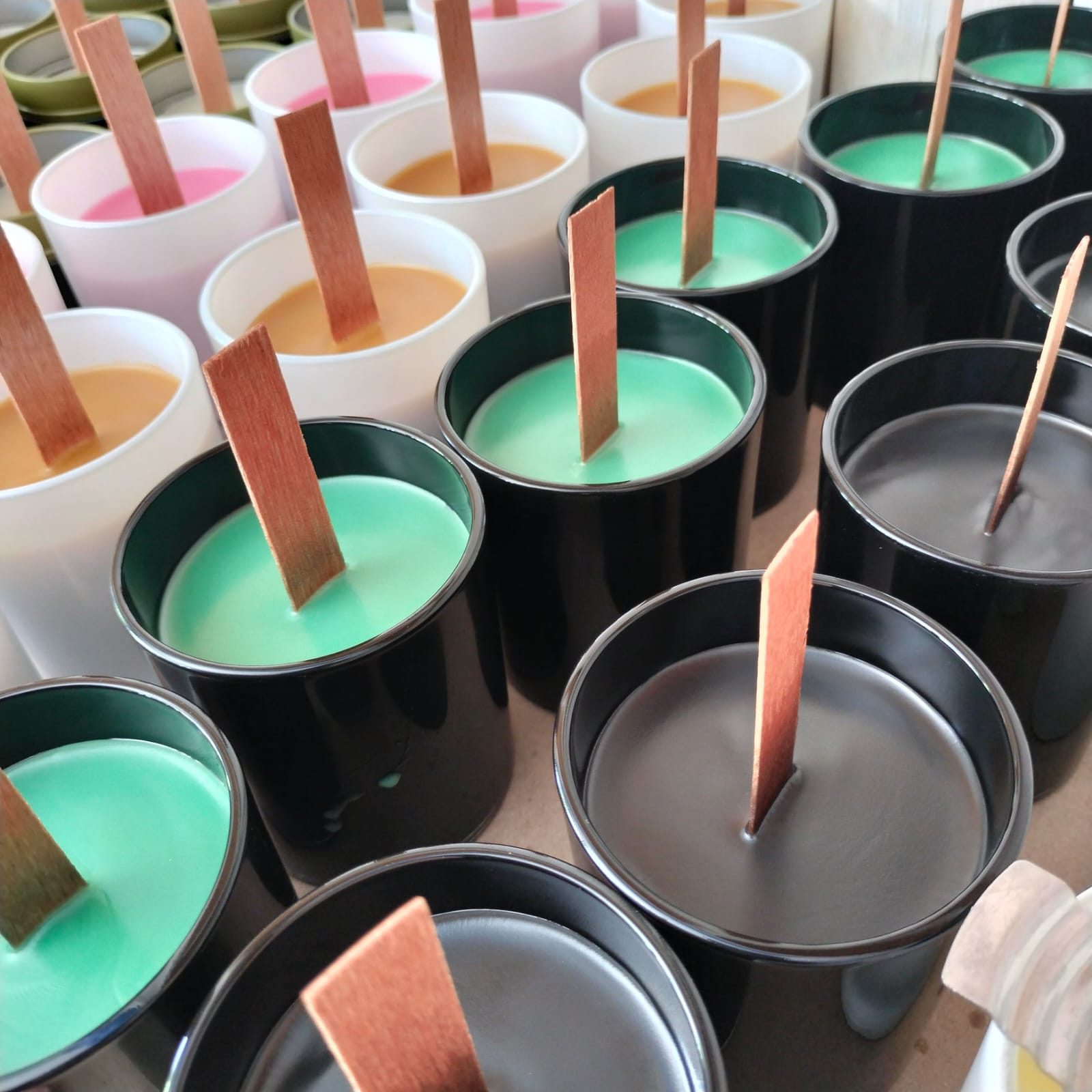 Hand-poured Sere candles in ceramic vessels